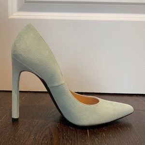 Stuart Weitzman mint suede pumps.